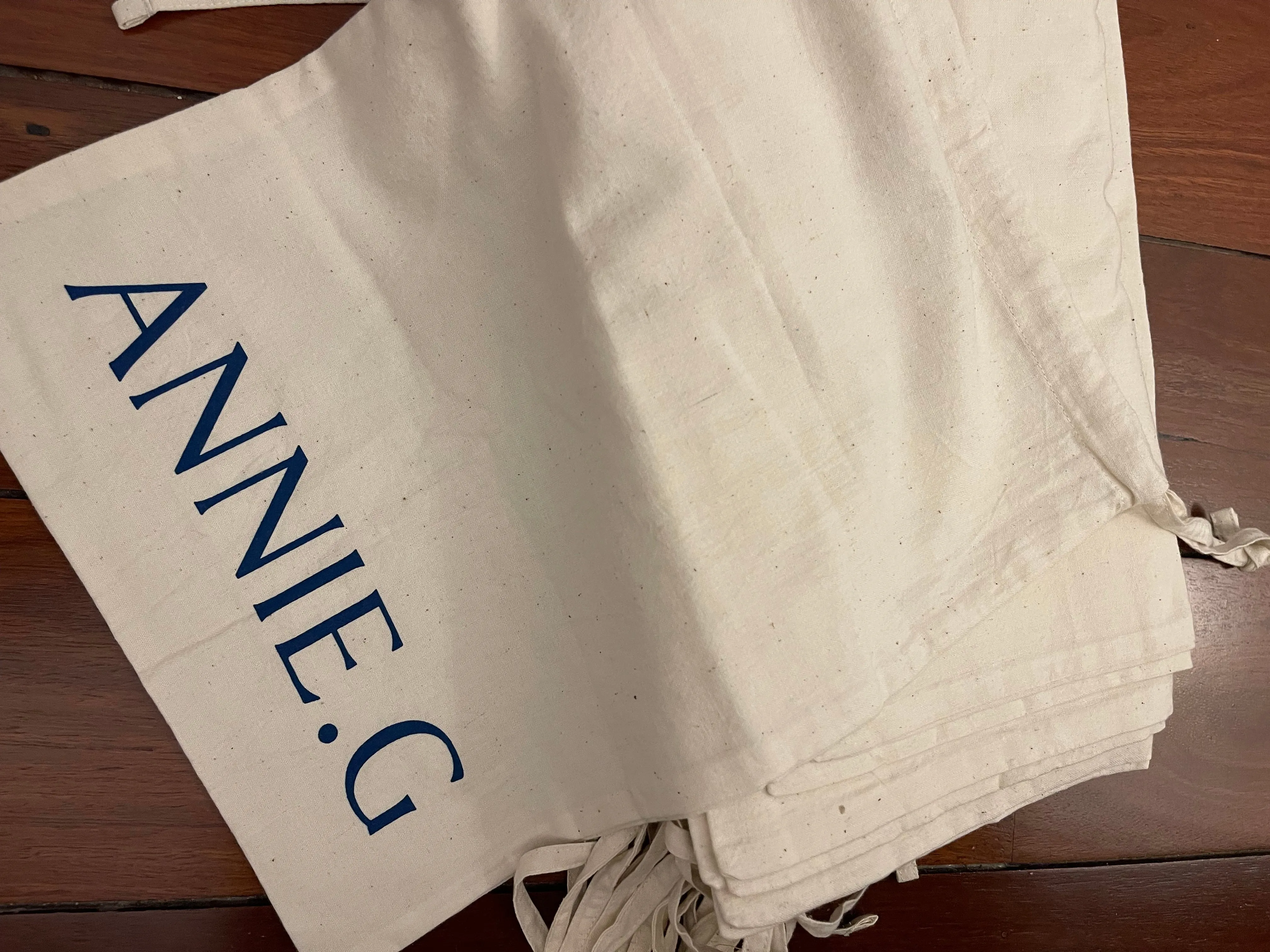 ANNIEG Logo Calico Drawstring Bag