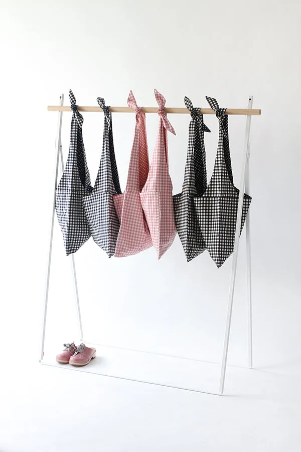 LYCEE TIE TOP REVERSIBLE BAG IN BLACK