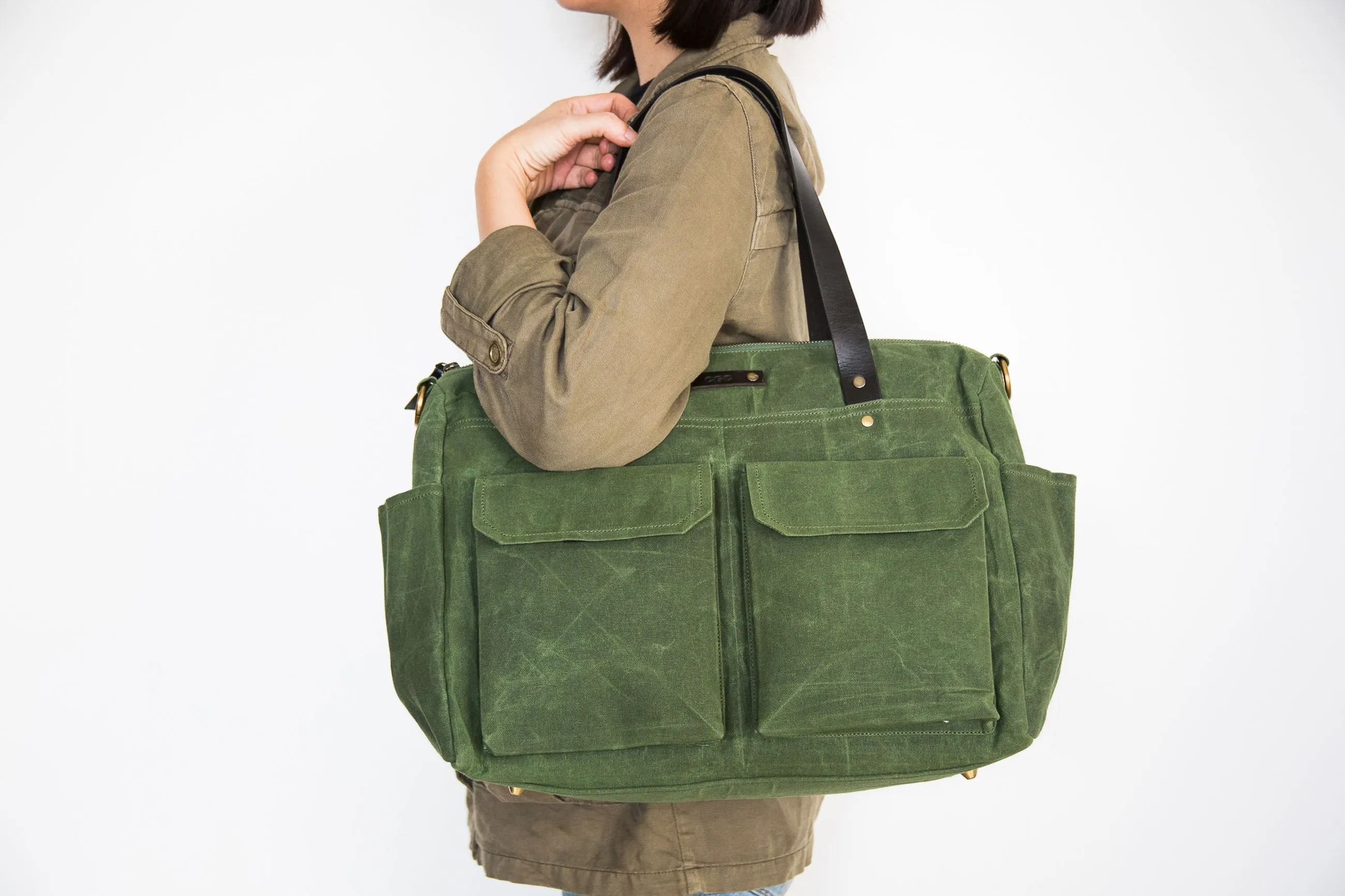 Pipa 11 Pocket Crossbody Diaper Bag Tote in Forest Green | Waxed Canvas & Leather