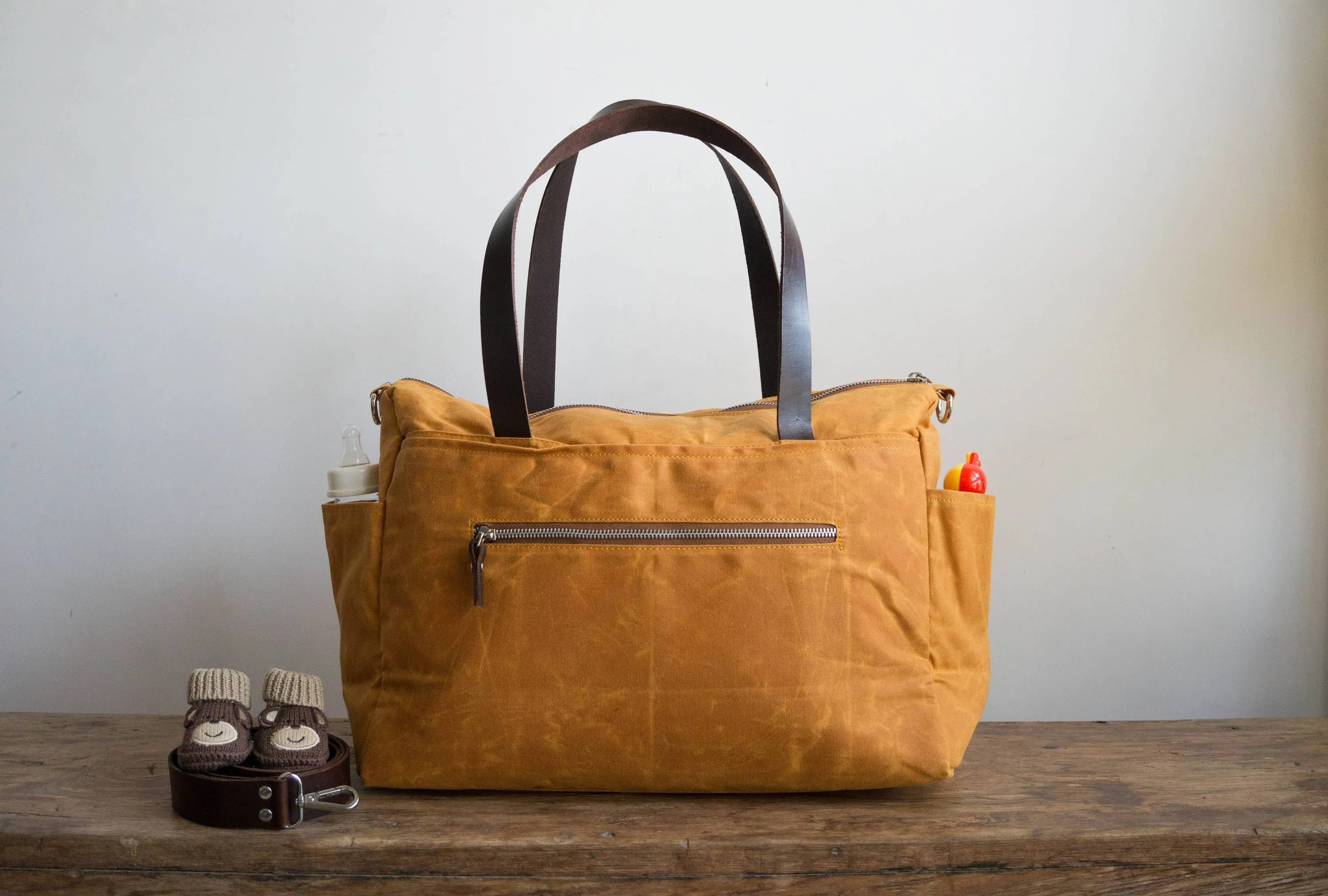 Pipa 11 Pocket Diaper Bag Tote in Burnt Yellow | Waxed Canvas & Leather